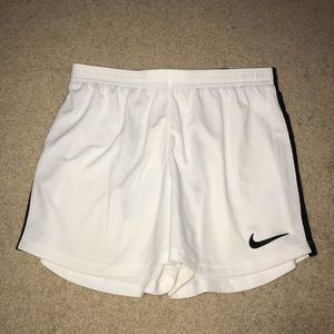 White Nike shorts